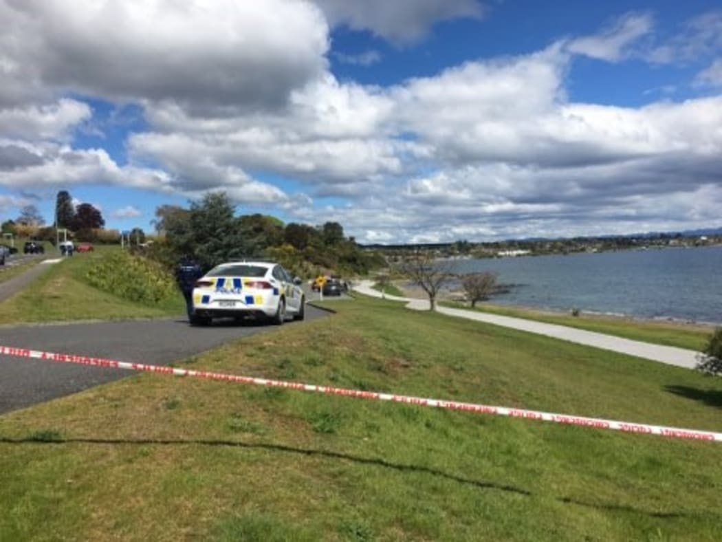 Police at the scene in Lake Taupō where two bodies were discovered.