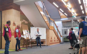 Rotorua Lakes Council emergency operations centre local controller Bruce Horne addresses others on the team.