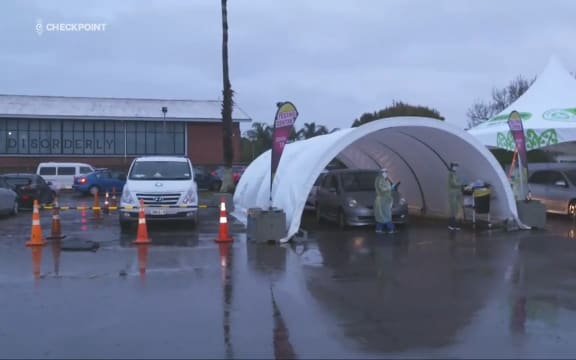 Queues form at an Auckland Covid-19 testing station on Tuesday after news of a Covid-19 community case.