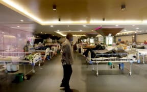NEW DELHI, INDIA - APRIL 15: Patients take a stroll at a quarantine center for Covid-19 coronavirus infected patients at a banquet hall that was converted into an isolation center to handle the rising cases of infection in New Delhi on April 15, 2021.