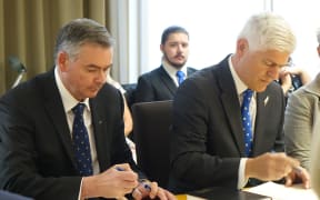 Scott Simpson, left, and Tim Macindoe are officially sworn in as new ministers outside Cabinet, on 2 May 2017.