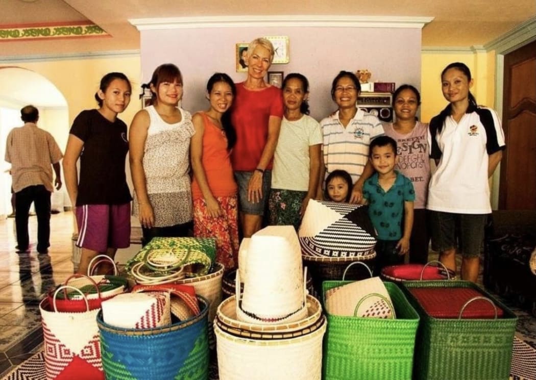Jacky McLaren with the Penan tribe's woven products.
