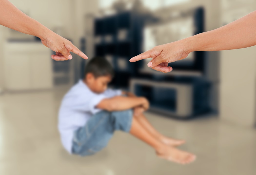 angry parents with boy