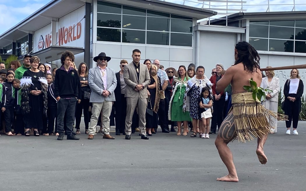 Kaikohe's Mutunga Rāmeka challenges incoming Mayor Moko Tepania (in light brown suit) and council with a wero at the start of the pōwhiri.