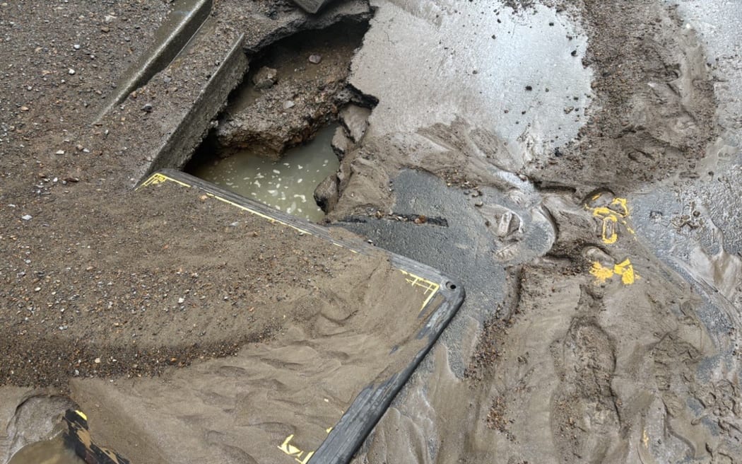 A burst water main in central Wellington has caused a street to flood and sent a large plume of brown out into the harbour.