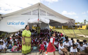 Tents are being used as temporary classrooms after the destruction of Cyclone Gita.