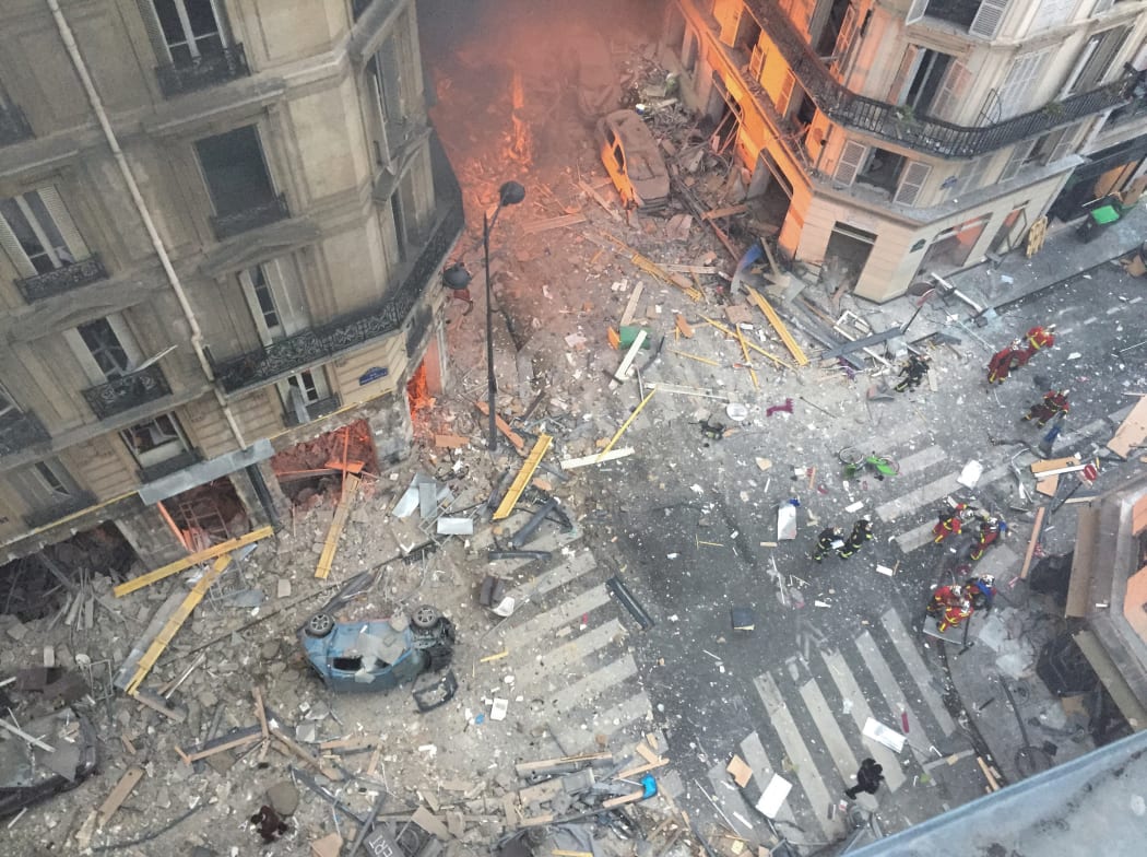 Debris and car wreckage following the explosion of a bakery in central Paris.