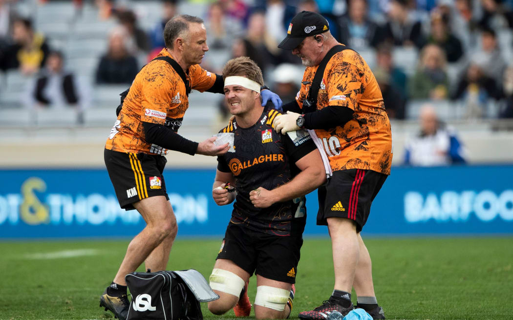 Chiefs captain Sam Cane gets some medical attention.