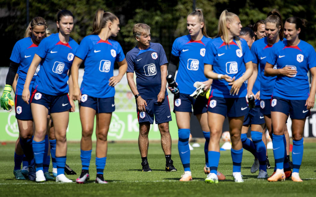 National coach Andries Jonker looks on next to Netherlands' players during a training session.