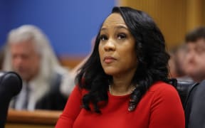 Fulton County District Attorney Fani Willis arrives for the final arguments in her disqualification hearing at the Fulton County Courthouse on March 1, 2024, in Atlanta, Georgia. Fulton County Superior Judge Scott McAfee is considering a motion to disqualify Willis over her romantic relationship with Special Prosecutor Nathan Wade, whom she appointed as special prosecutor in the election interference charges against former president Donald Trump. (Photo by Alex Slitz / POOL / AFP)