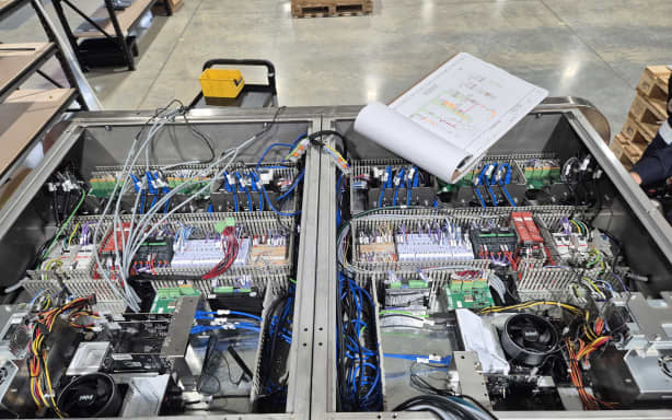 A Gen 5 Apple Packer being built.
