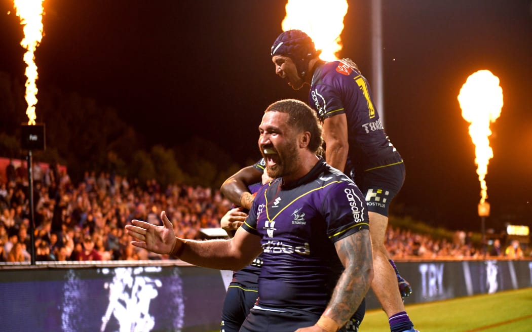 Kenny Bromwich celebrates a Melbourne try.
