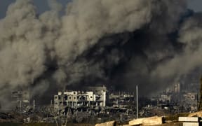 Smoke rises during an Israeli military bombardment of the northern Gaza Strip on November 15, 2023, amid the ongoing battles between Israel and the Palestinian group Hamas. Thousands of civilians, both Palestinians and Israelis, have died since October 7, 2023, after Palestinian Hamas militants based in the Gaza Strip entered southern Israel in an unprecedented attack triggering a war declared by Israel on Hamas with retaliatory bombings on Gaza. (Photo by FADEL SENNA / AFP)