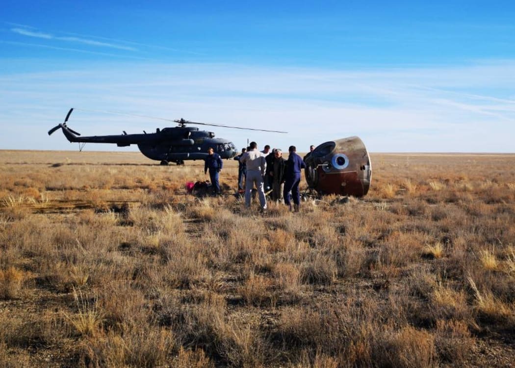 Russia's Soyuz MS-10 capsule lies on the ground after an emergency landing at a remote location in Kazakhstan.