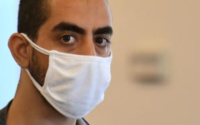 Hadi Matar, the man accused in the attempted murder of British author Salman Rushdie, appears in court for a procedural hearing at Chautauqua County Courthouse in Mayville, New York on 18 August 2022.