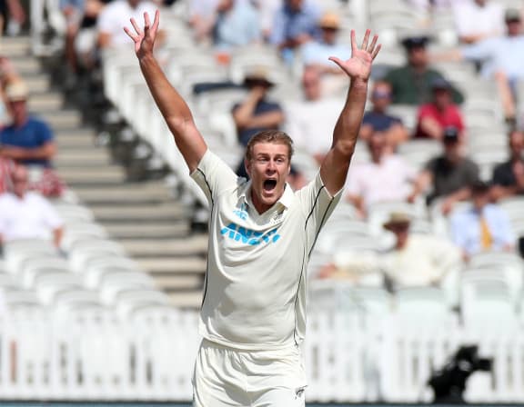 Kyle Jamieson celebrates.