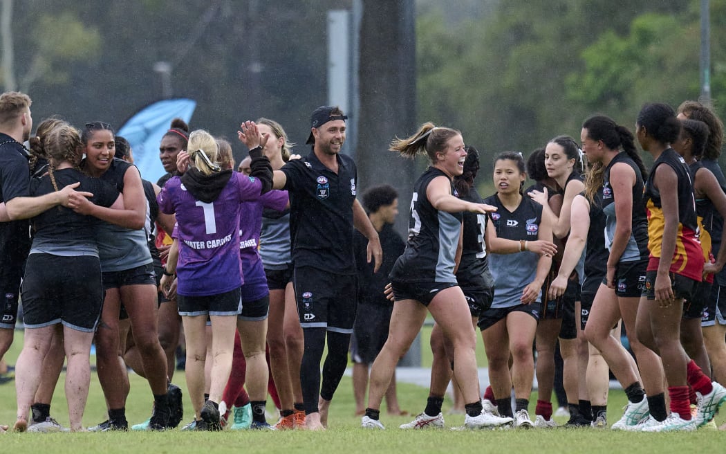 The NZ Kahu celebrate their win over PNG.