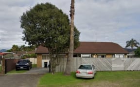 A Mount Maunganui house has been forfeited to the Crown, after it was used by a madam who was illegally employing sex workers.