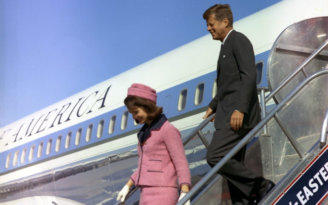 President John F Kennedy arrives in Dallas with his wife Jackie on the morning of his assassination.