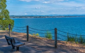 Bench at lake Taupo at New Zealand
