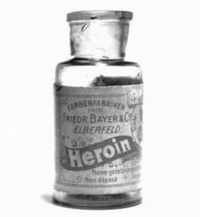 An image of a small jar of heroin, available for commercial sale.