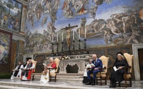 This photo taken and handout on October 23, 2025 by The Vatican Media shows Britain's King Charles III and Britain's Queen Camilla during an Eucumenical prayer led by Pope Leo XIV in the Sistine Chapel in The Vatican.