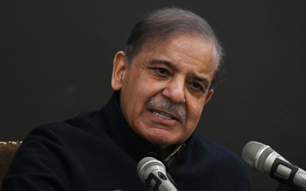 Pakistan's former Prime Minister and leader of the Pakistan Muslim League-Nawaz (PML-N) party Shehbaz Sharif speaks during a press conference in Lahore on February 13, 2024. (Photo by Arif ALI / AFP)