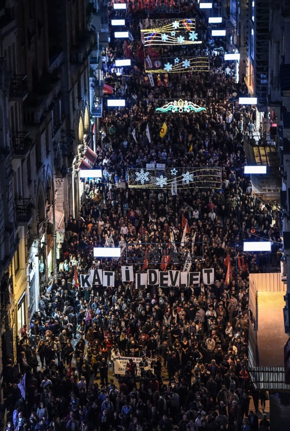 Thousands of protesters march along Istiklal Avenue in Istanbul against the deadly attack in Ankara when bombs ripped through an anti-government peace rally.