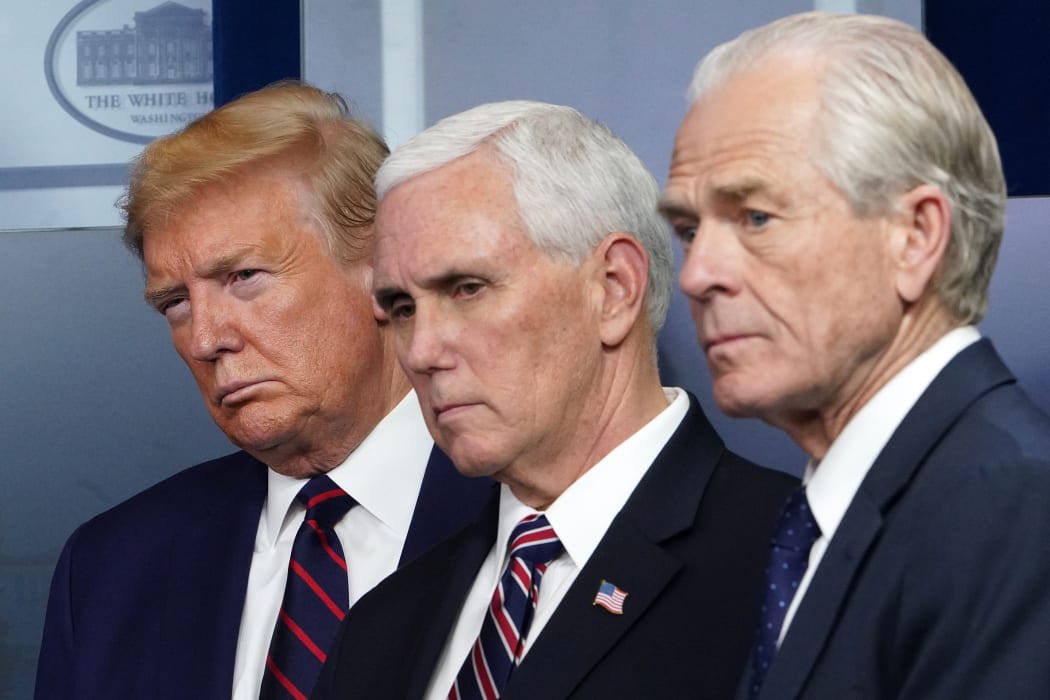 US President Donald Trump, US Vice President Mike Pence and Director of Tra.de and Manufacturing Policy Peter Navarro look on during the April 2 briefing on the novel coronavirus
