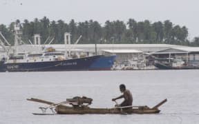 Fishing vessels, both modern and traditional, in the Madang lagoon, Papua New Guinea; part of the planned Pacific Marine Industrial Zone.