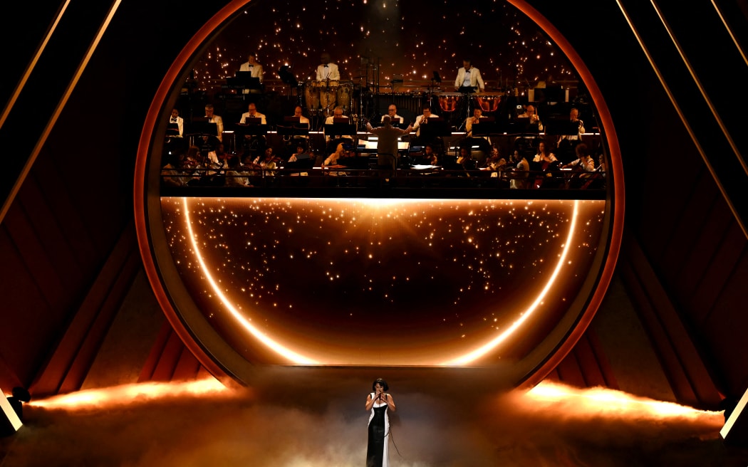 British singer-songweriter Raye performs onstage during the 97th Annual Academy Awards at the Dolby Theatre in Hollywood, California on March 2, 2025. (Photo by Patrick T. Fallon / AFP)