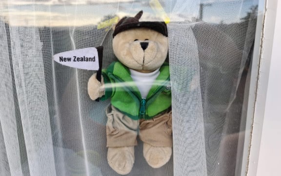 Teddy bear in window to cheer up kids in neighbourhood during Covid-19 lockdown