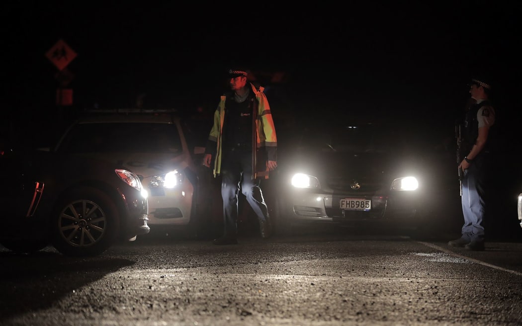 The police cordon at Onepu Springs road this evening.