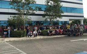 Construction workers rally outside the Department of Labor offices
