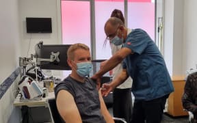 Prime Minister Chris Hipkins getting his flu vaccine and Covid booster shot at Queen Street Medical Centre in Upper Hutt on 1 April 2023.