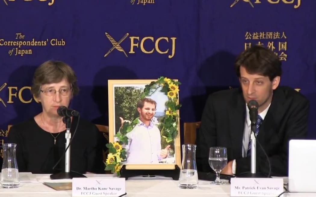 Martha Savage, left, and Patrick Savage at a news conference in