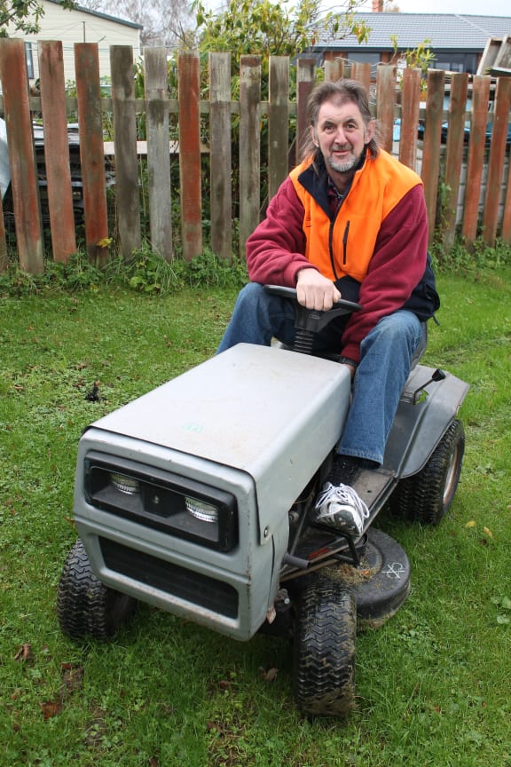 Photo of Ride-On Racer, Andrew Williamson on his lawnmower.