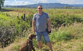 Jo Spod is not happy with his view of a new solar farm being built across the road from him as screening plants fail to meet consent conditions.