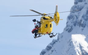 US' Lindsey Vonn is transported by helicopter after crashing in the women's downhill event during the Milano Cortina Winter Olympics.