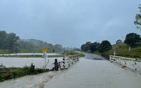 Floodwater covers Fairlies Bridge, north of Te Puia, as Cyclone Gabrielle brings heavy rain to the Tairāwhiti region.
