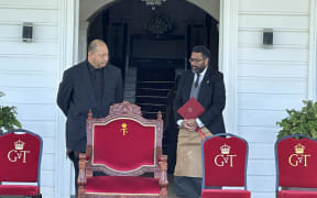 King Tupou VI (left) at the Royal Palace with Tonga's Prime Minister Lord Fakafanua