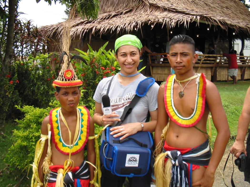 Sara Vui-Talitu covering the Pacific Arts Festival in Palau, 2004