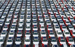 A large number of Chinese-made vehicles gather at Yantai Port waiting to be loaded for export in Yantai, China, on October 23, 2024. (Photo by Costfoto/NurPhoto) (Photo by CFOTO / NurPhoto / NurPhoto via AFP)