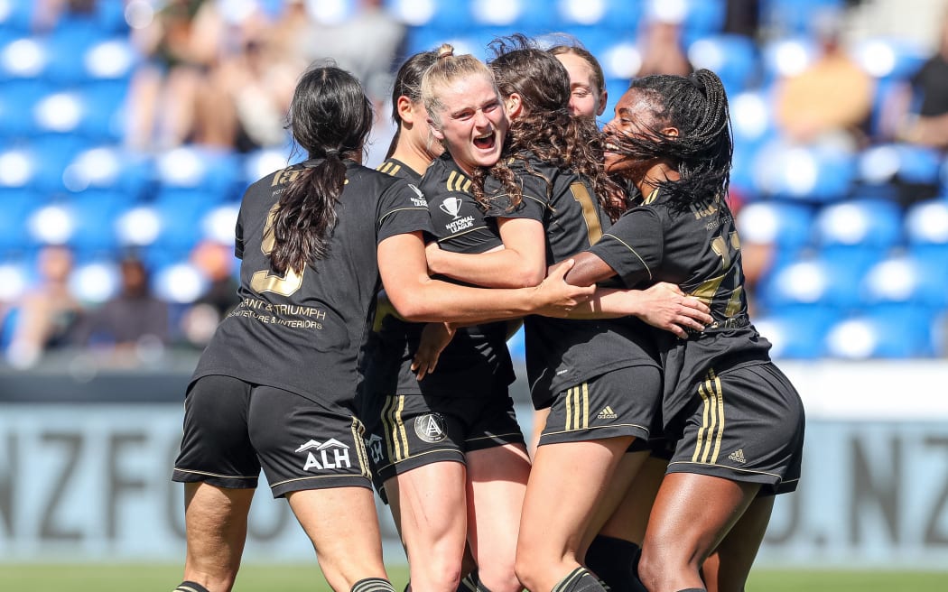Auckland United's Alexis Cook scores and celebrates the first goal of the National League Championship final against Southern United.