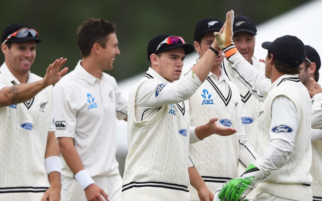 The Black Caps celebrate Trent Boult's first wicket of the innings.