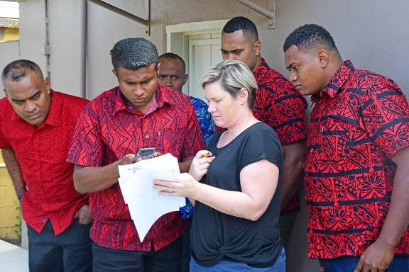 Fijian seasonal workers with Sascha Piggot from Australia's Pacific Labour Facility.