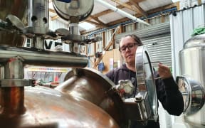 Janet Charteris at work in her distillery