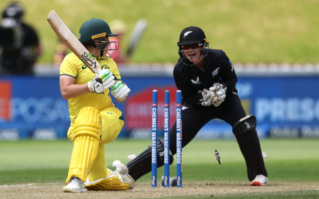 Australia captain Alyssa Healy (L) is bowled watched by White Ferns wicket keeper Izzy Gaze during the 3rd ODI New Zealand White Ferns v Australia Rose Bowl ODI series at Cello Basin Reserve, Wellington, 23 December 2024. © Copyright image by Marty Melville / www.photosport.nz