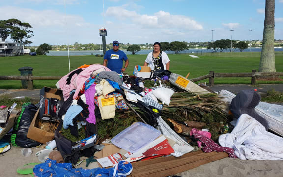 Andrew Va'a and Josephine Bartley behind the fly-tipped dump.