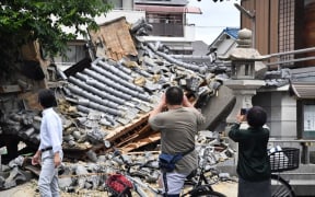 Myotokuji temple is destroyed by an earthquake registering a weak 6 on the Japanese seismic scale in Ibaraki City, the north side of Osaka Prefecture on June 18, 2018.